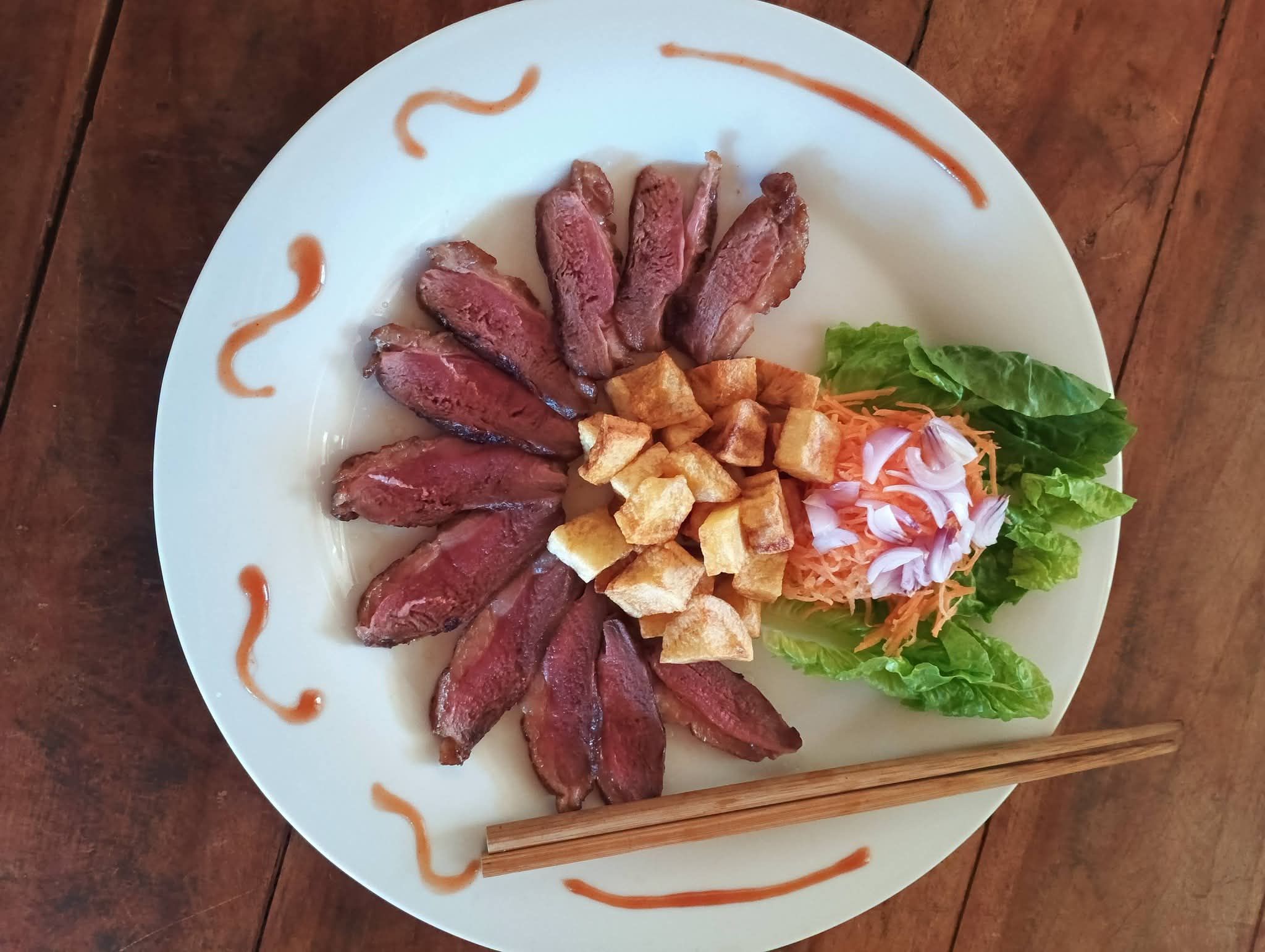 Magret de canard sauce poivre vert